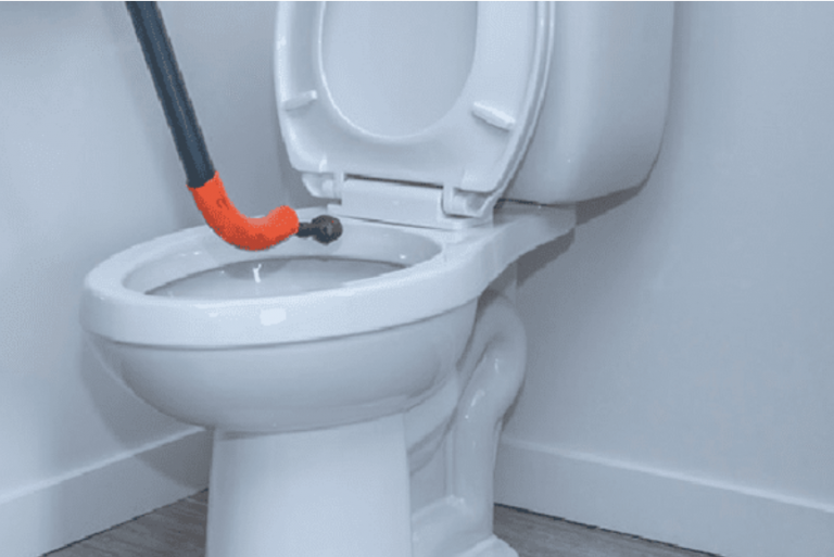 toilet bowl being unplugged